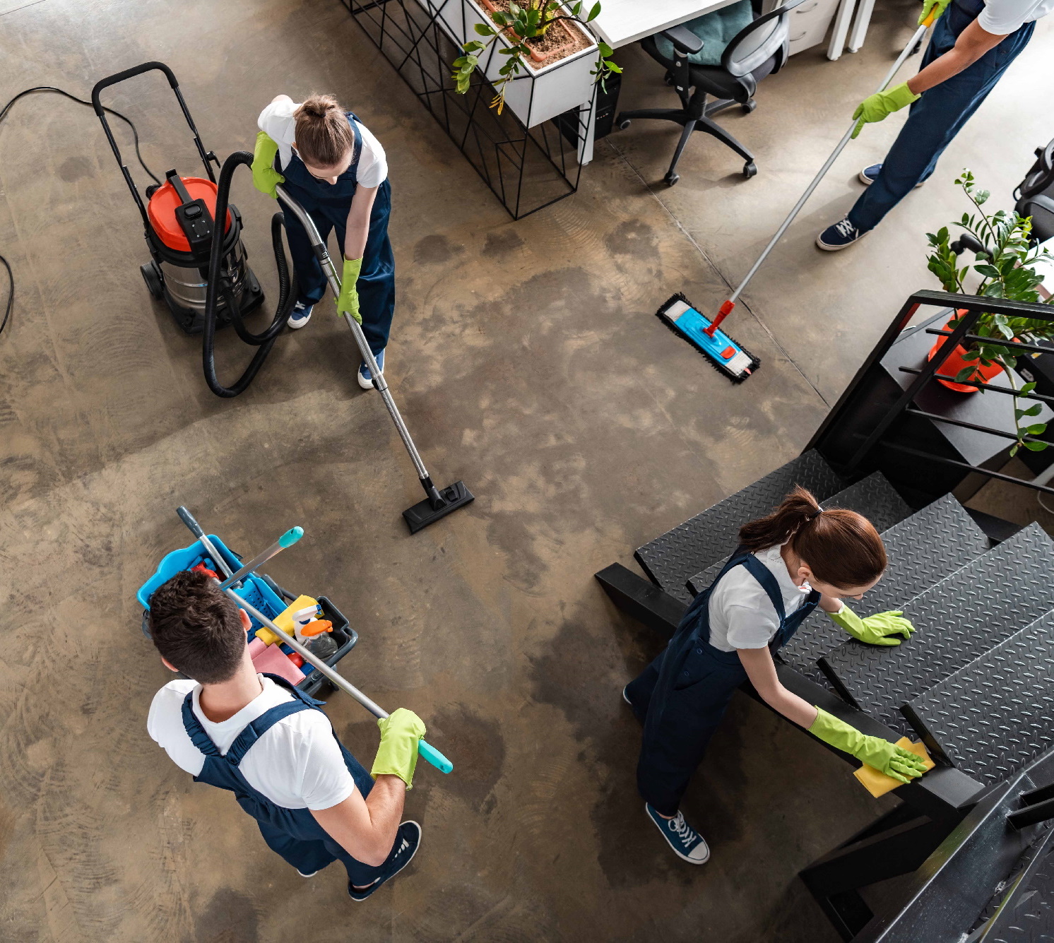 top view of cleaning company team cleaning modern office